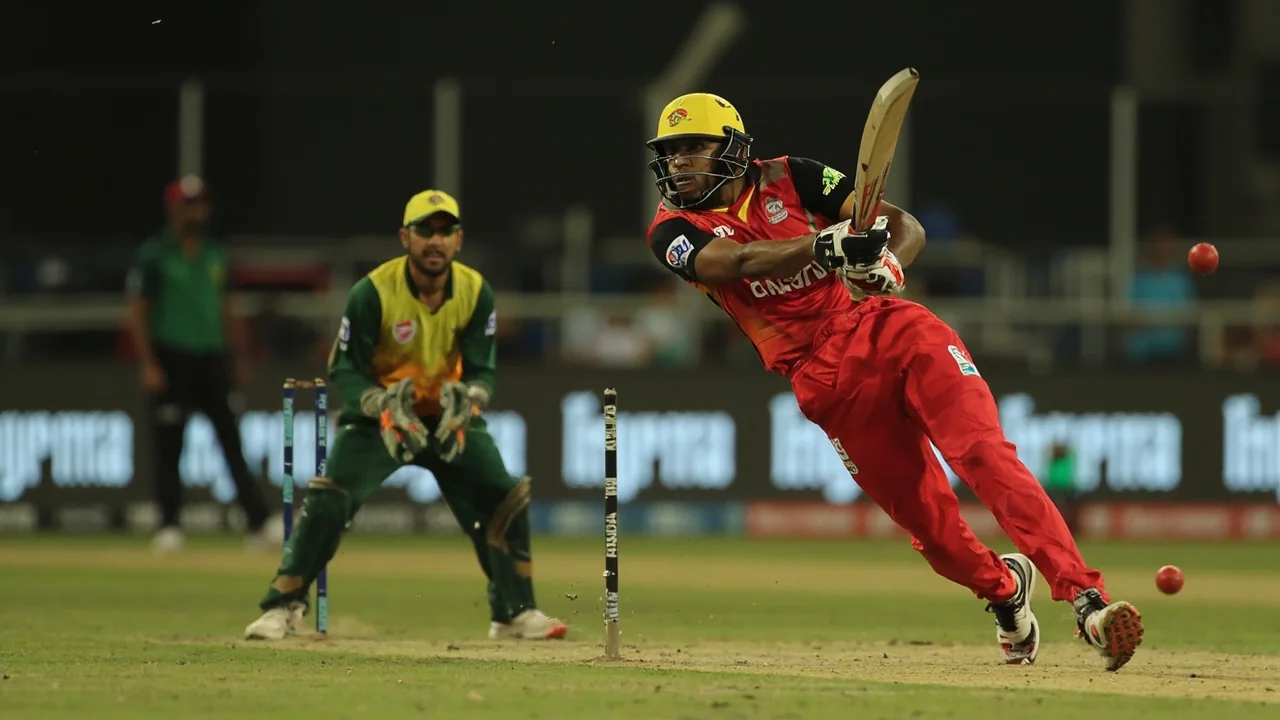 Tight sideline frame of a batter playing a pull shot during a T20 fixture, the kind of stroke that drives boundary points in fantasy cricket